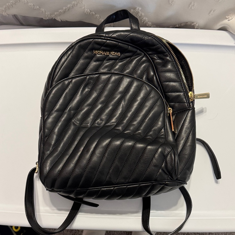 Michael Kors Black Quilted Backpack with Gold Details
